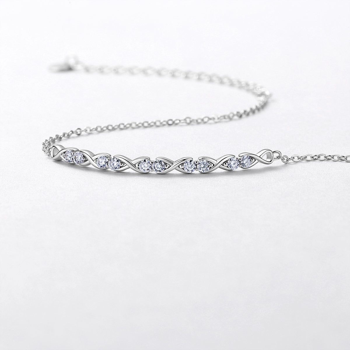 Sterling Silver Infinity Bracelet With Moissanite, D-VVS1 — detail close-up