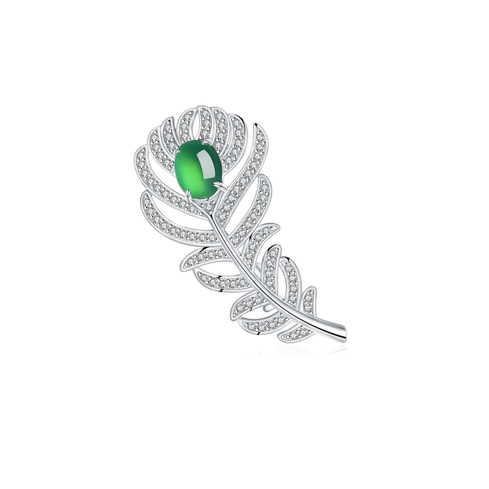 Sterling silver feather brooch with green chrysoprase cabochon