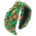 Green and orange plaid knotted headband with rhinestones