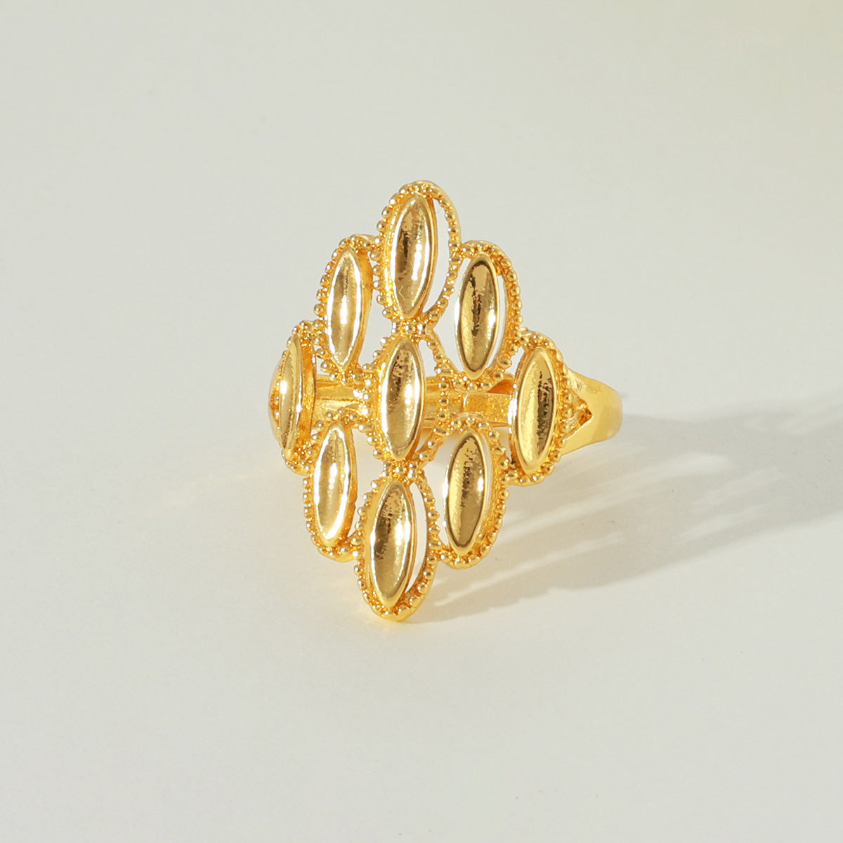 Gold-tone hollow marquise-shaped open ring