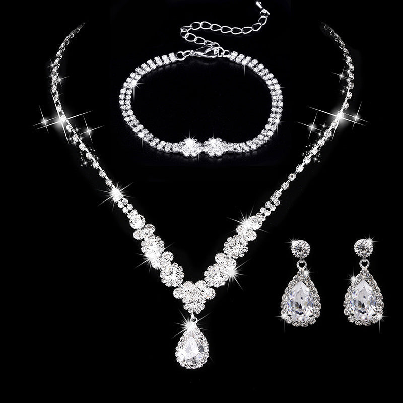 Rhinestone and Zircon Teardrop Necklace and Earrings Bridal Set in Four Styles — scale reference