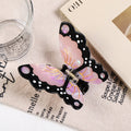 Pink and black cellulose acetate butterfly hair claw clip