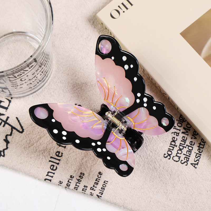 Pink and black cellulose acetate butterfly hair claw clip