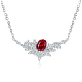 Sterling silver necklace with oval lab-grown ruby and marquise stones