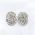 Silver-tone double arc earrings with clear rhinestones