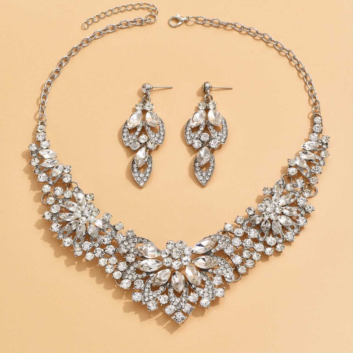 Stone-Set Flower Necklace and Earrings Bridal Set in Green, Red — front view